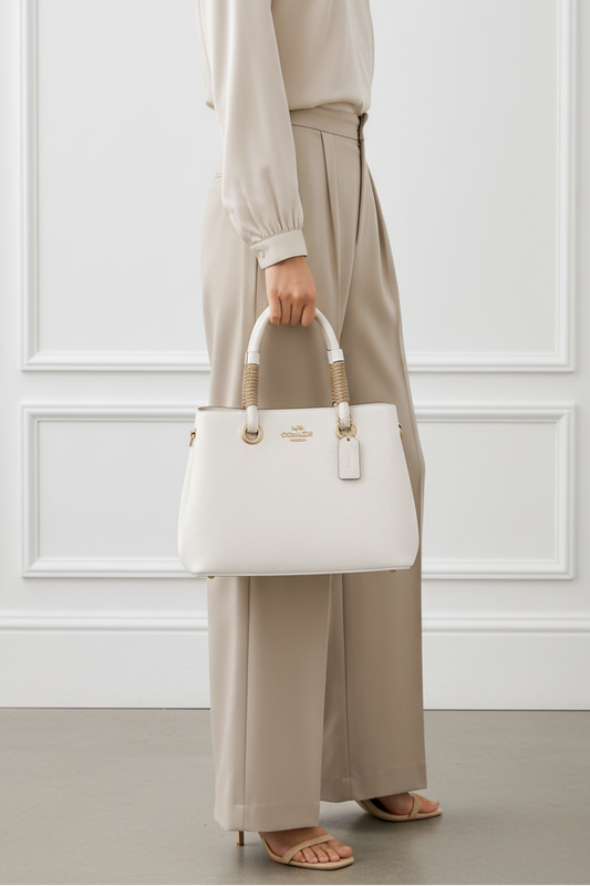 COACH Pebbled Leather Women's Handbag in White with Classic Braided Rope Handles