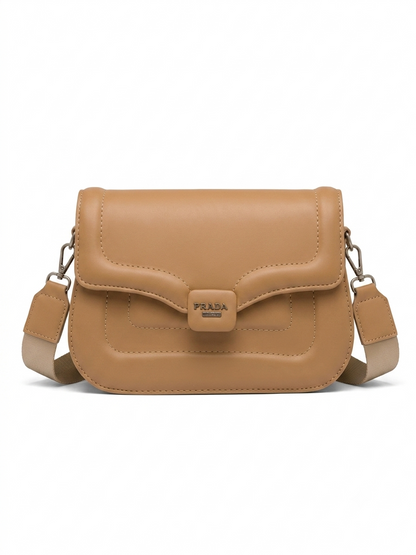 Camel quilted leather flap crossbody bag front view with magnetic snap closure