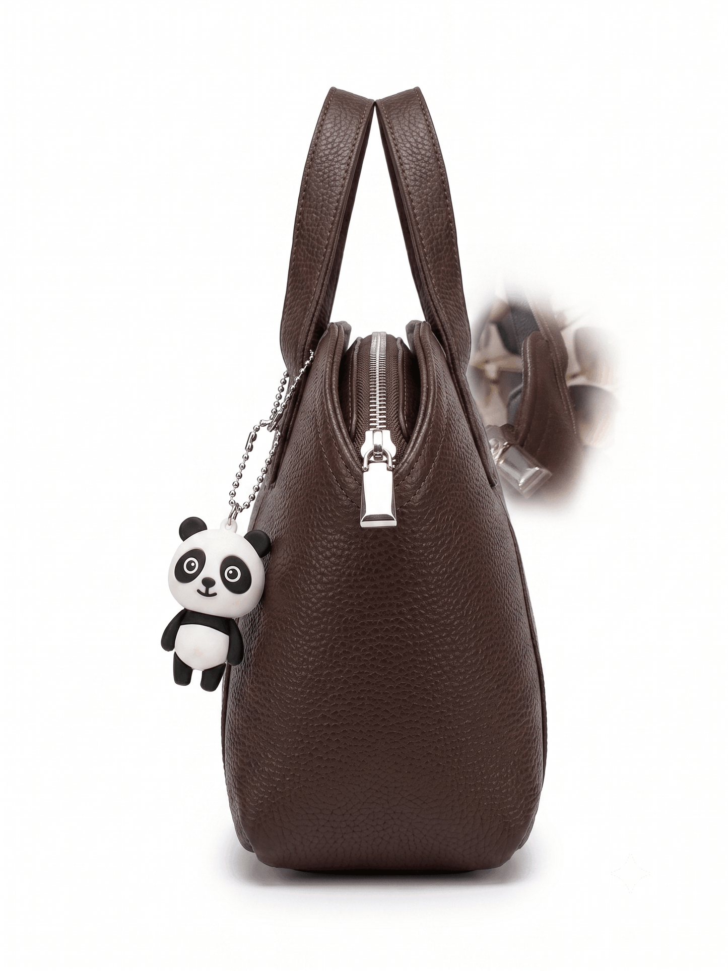 Brown pebbled leather mini satchel side view showing zipper and panda charm