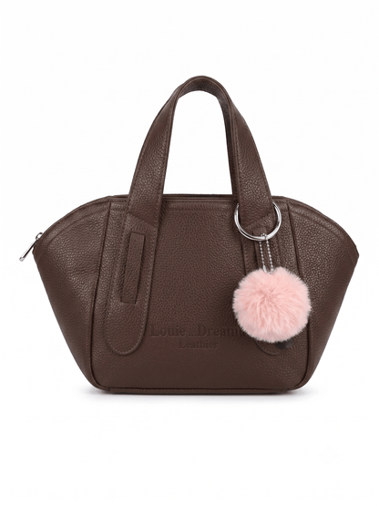 Brown pebbled leather mini satchel front view with pink pom-pom charm
