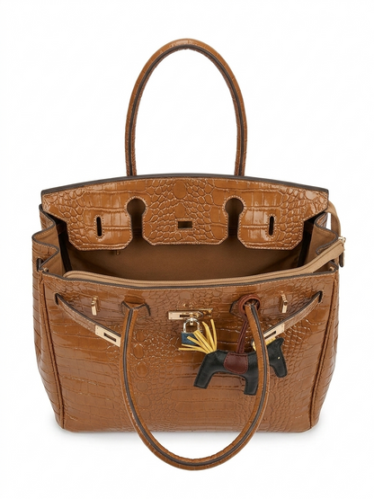 Tan crocodile-embossed leather tote bag open interior view with gold hardware